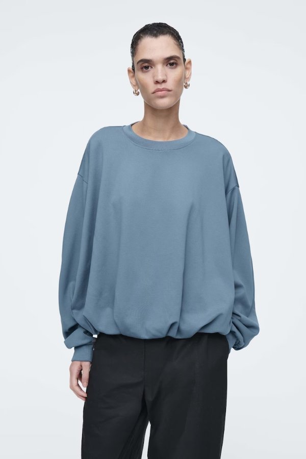 SWEATSHIRT MIT BALLONSAUM