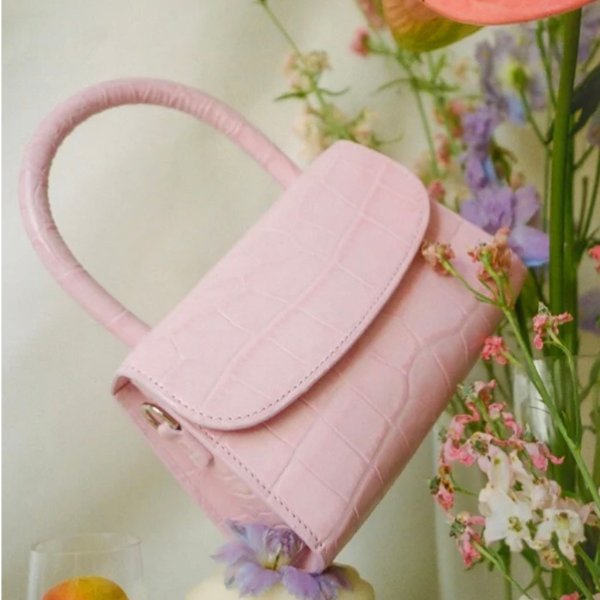 樱花粉手提包