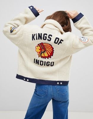 Kings Of Indigo - Veste en jean et imitation peau de mouton a ecussons | ASOS