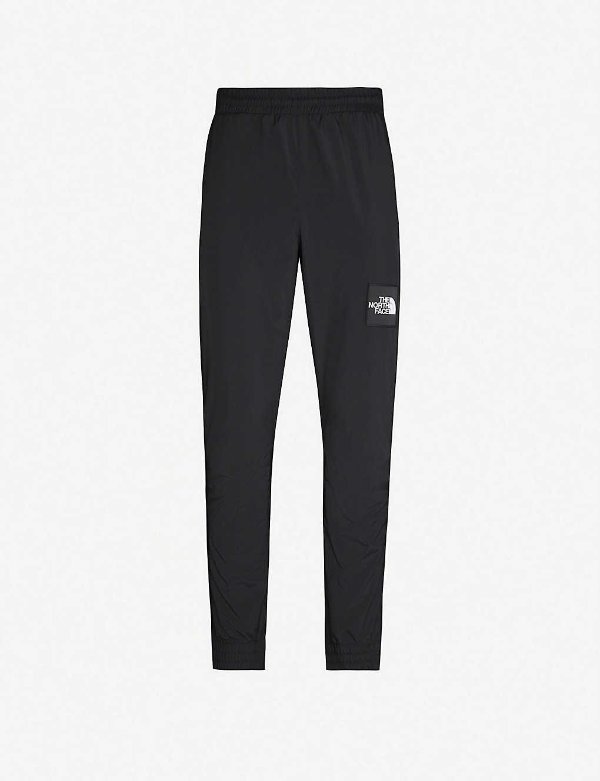 Logo-print shell jogging bottoms