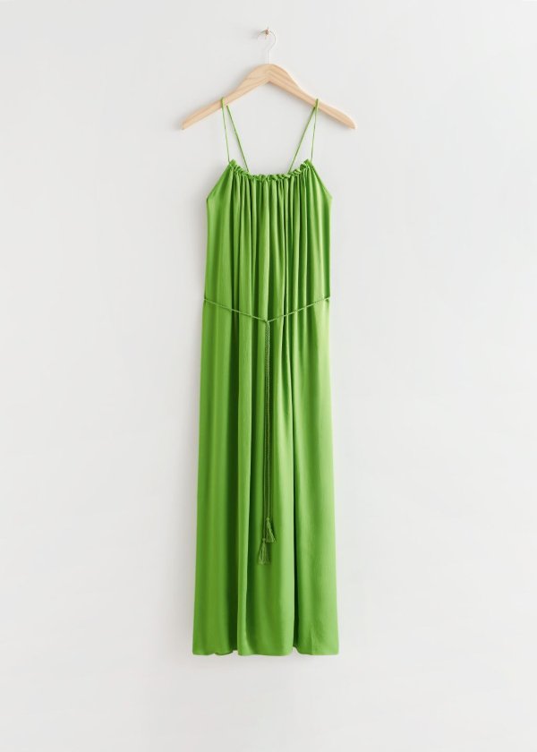 果绿色吊带裙 