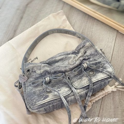 多口袋蝴蝶结手提包