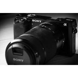 Sony a6000 Body + 16-50mm & 55-210mm Lens + $100GC