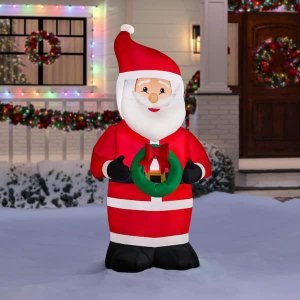 Home Accents Holiday 6.5 ft. H x 3.25 ft. W Airblown Santa Christmas Inflatable with LED Lights