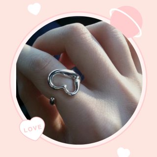 Elsa Peretti® Open Heart ring in sterling silver, medium. | Tiffany & Co.