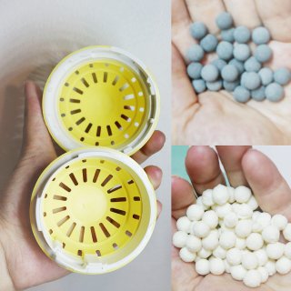 white mineral pellets,dark colored tourmaline pellets