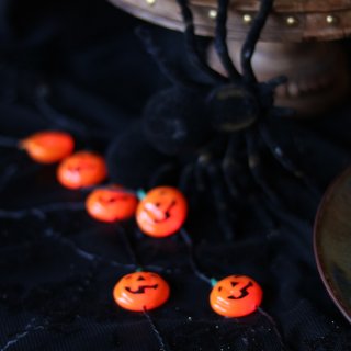 Place & Time Halloween 15in Light Up Pumpkin Necklace | JOANN