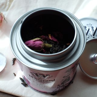 #3: 带着爱丽丝梦游仙境图画的茶叶罐，...