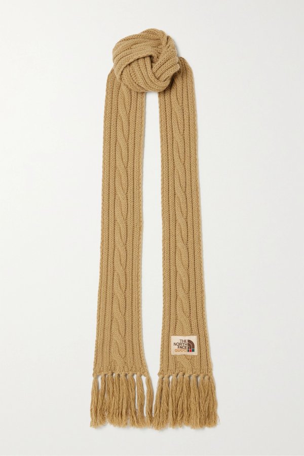 + The North Face appliqued fringed cable-knit wool scarf