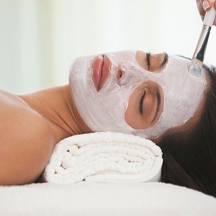 One or Two Customized Facials Plus Credit Toward Skincare Products at Aria Salon & Spa (47% Off)