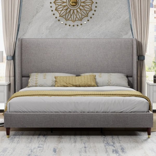 Belo Upholstered Wingback Bed