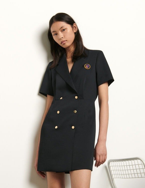 Tailored dress with button fastening