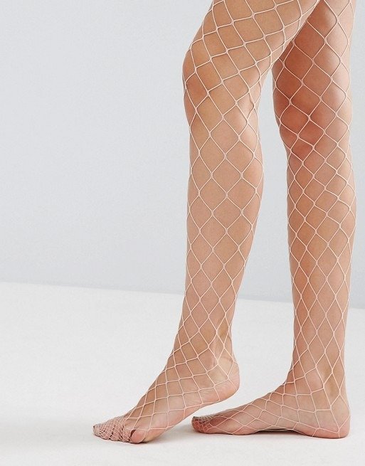 Oversized Fishnet Tights In Pink at asos.com