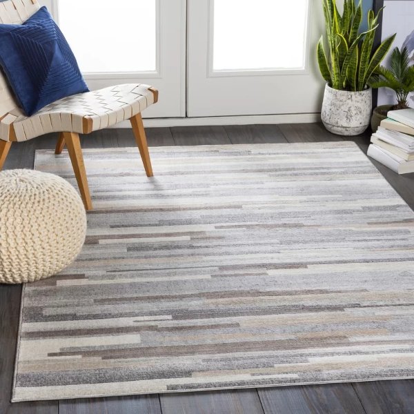 Warlick Medium Gray/Tan/White Area RugWarlick Medium Gray/Tan/White Area RugProduct OverviewRatings & ReviewsQuestions & AnswersShipping & ReturnsMore to Explore