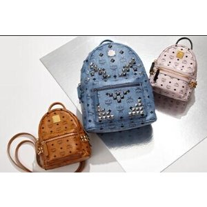 with Purchase of MCM Handbags @ Saks Fifth Avenue