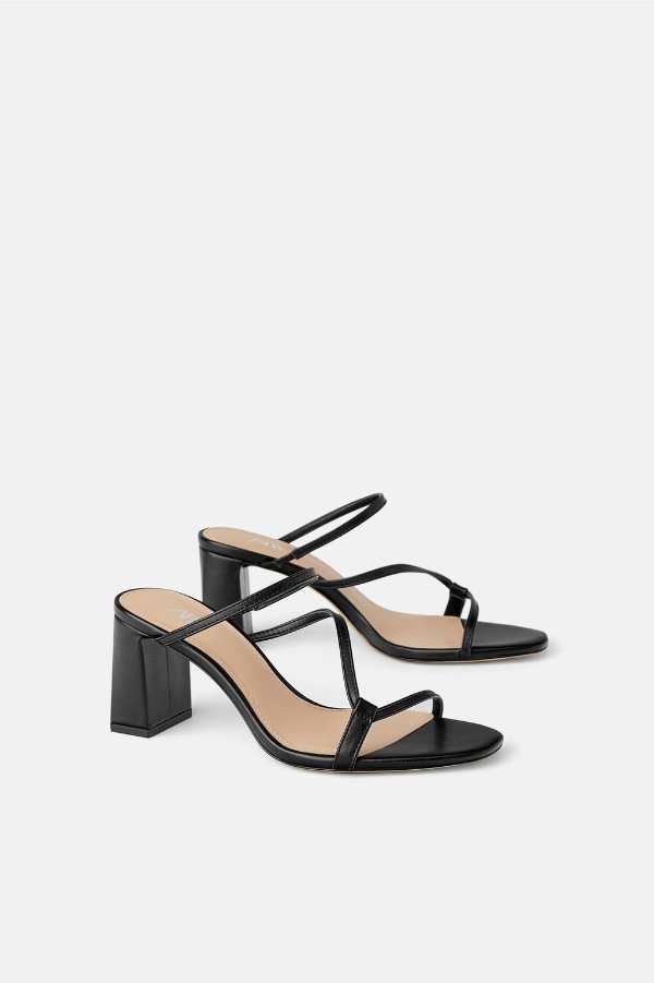 HEELED MULES WITH ASYMMETRICAL STRAPS Details