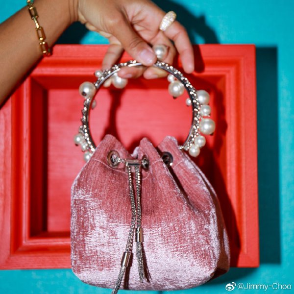 Bon Bon faux pearl-embellished velvet bucket bag