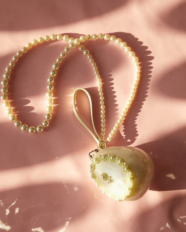 Egg beaded pearl-effect clutch bag | Simone Rocha