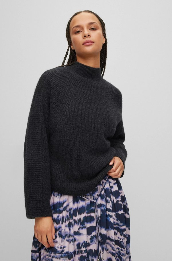 Relaxed-fit sweater with mock neckline and curved hem