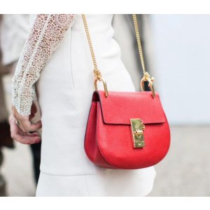 with Select Red Handbags Purchase @ Saks Fifth Avenue