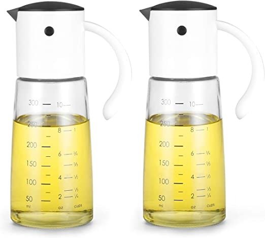 Olive Oil Dispenser Bottle for Kitchen Cooking - Auto Flip Condiment Container With Automatic Cap and Stopper - Leakproof Vinegar Glass Cruet Stainless Steel Non-Drip Spout