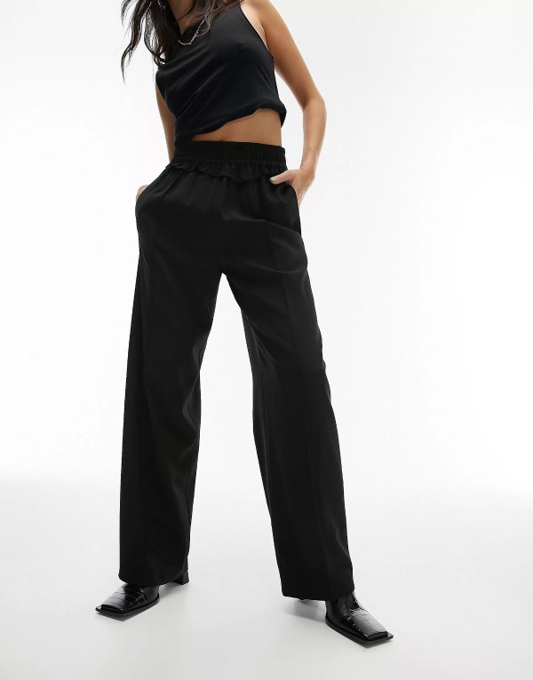 tailored frill waist pants in black