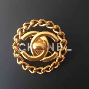 gold Steel CHANEL Pin & brooche - Vestiaire Collective