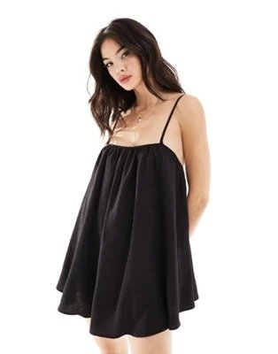 Sunstorm easy throw-on volume strappy mini beach dress in black