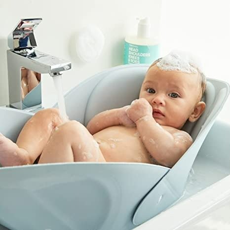 Soft Sink Baby Bath by Frida Baby Easy to Clean Baby Bathtub + Bath Cushion That Supports Baby's Head