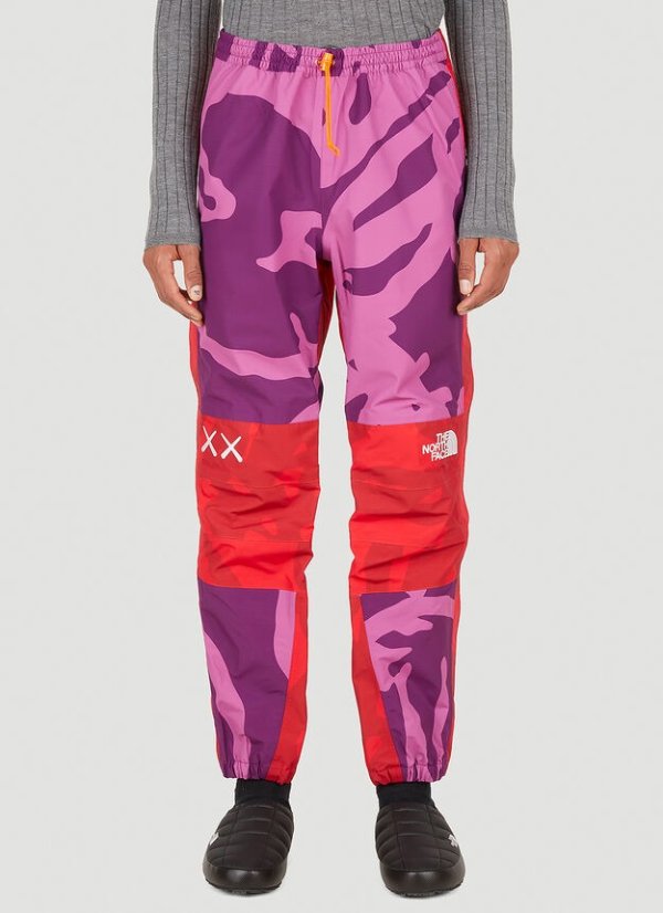 x KAWS Mountain Light Track Pants in Pink