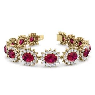 25 Carat Oval Shape Ruby and Halo Diamond Bracelet In 14 Karat Yellow Gold, 7 Inches