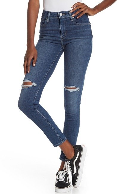721 Distressed High Rise Skinny Jeans