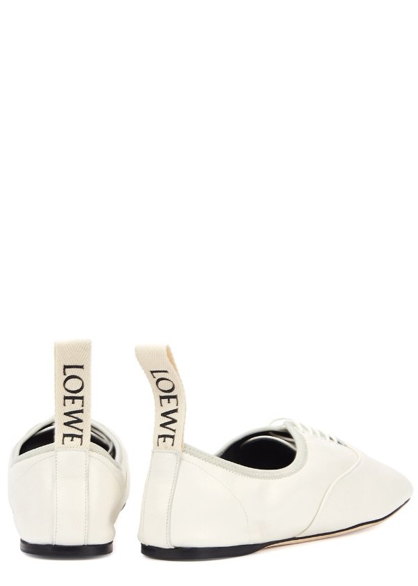 Off-white leather pumps