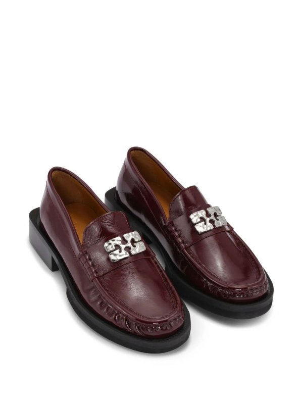 Butterfly-plaque leather loafers