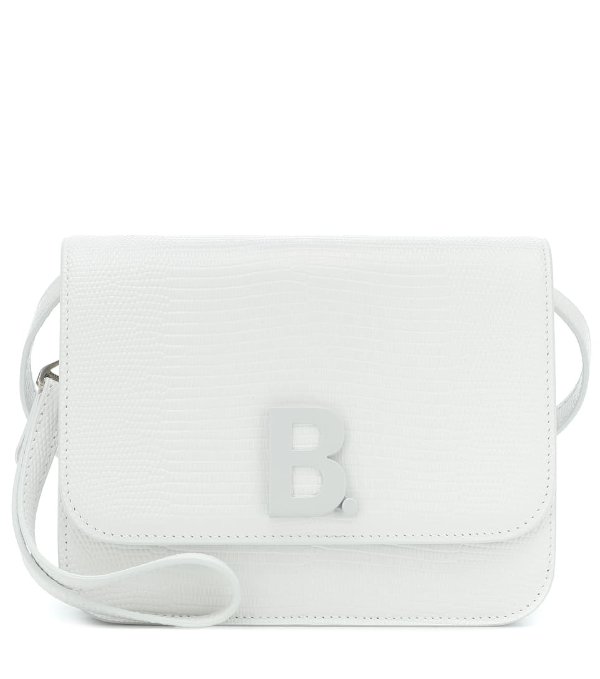 B. Small leather shoulder bag