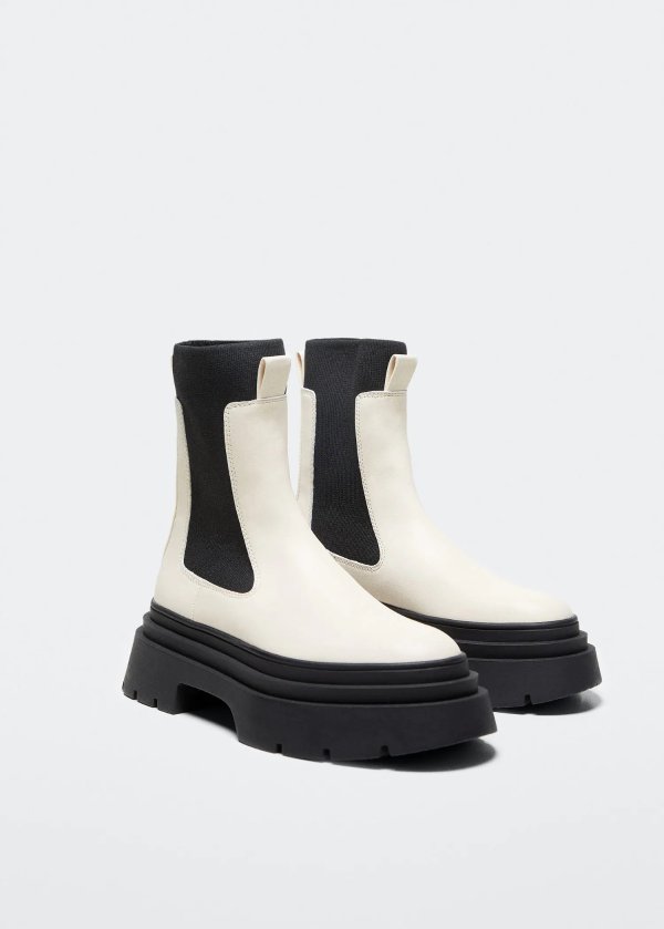 Track sole contrast ankle boots - Women | Mango USA