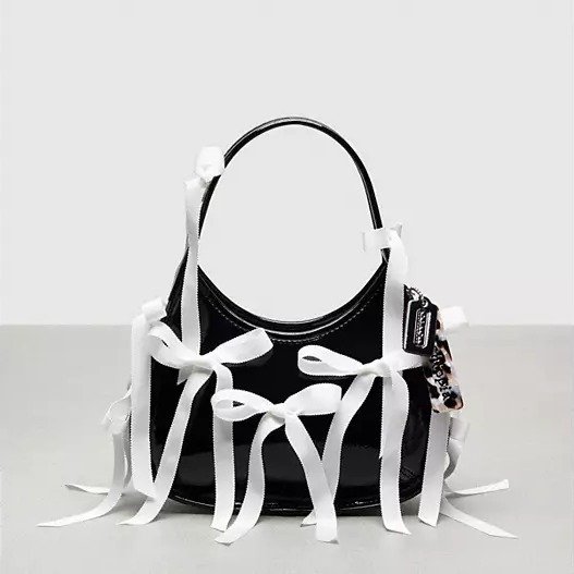 Ergo Bag In Crinkle Patent Coachtopia Leather With Bows All Over
