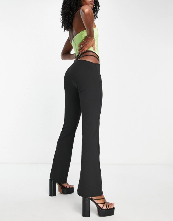 ASOS DESIGN flare pants in crepe with cut out side detail in black