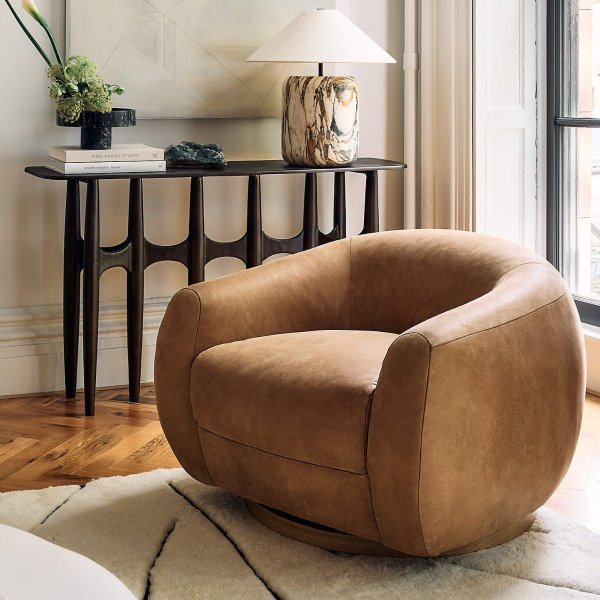 Laszlo Caramel Brown Leather Swivel Chair by Ross Cassidy