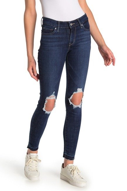 711 Distressed Skinny Jeans