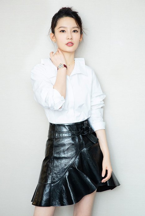 JANAK Asymmetric skirt in patent leather