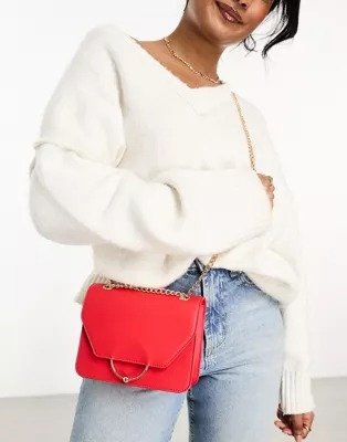 ring and ball shoulder bag with interchangeable chain strap in red