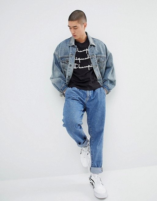 Champion T-Shirt With Repeat Logo In Black at asos.com