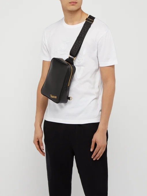 Logo-plaque leather cross-body bag | Versace | MATCHESFASHION.COM US