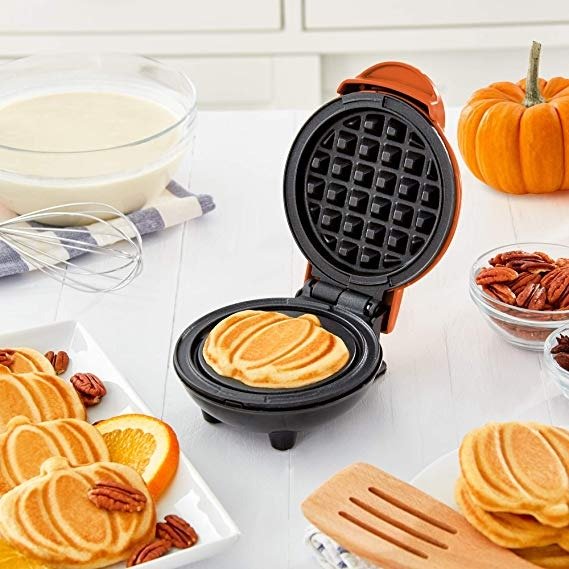 DMWP001OR Mini Waffle Maker Machine for Pumpkin Shaped Individual Waffles, Paninis, Hash browns, & other on the go Breakfast, Lunch, or Snacks - Orange