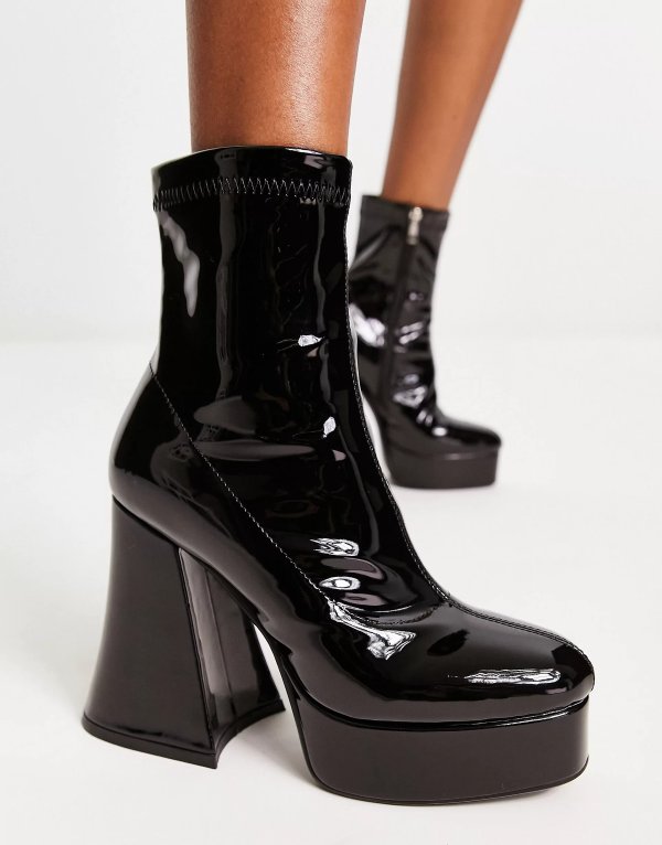 flare heeled platform boots in black vinyl Exclusive to ASOS