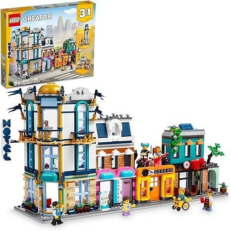 Creator Main Street 31141 Building Toy Set, 3 in 1 Features a Toy City Art Deco Building, Market Street Hotel, Cafe Music Store and 6 Minifigures, Endless Play Possibilities for Boys and Girls