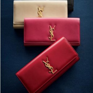 with YSL Clutch of$1000 or More @ Neiman Marcus