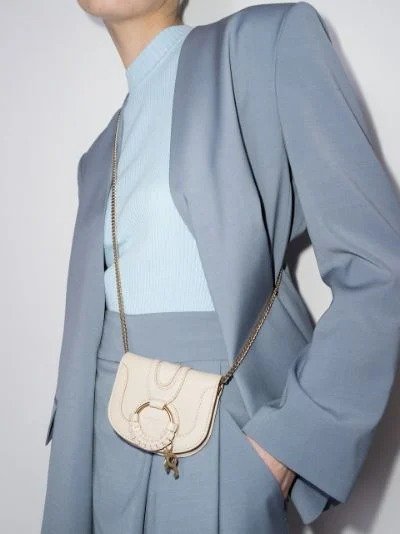 neutral Hana mini leather cross body bag | Browns
