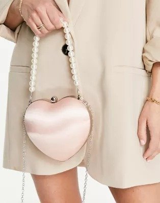 Exclusive heart clutch bag in pink satin with faux pearl handle